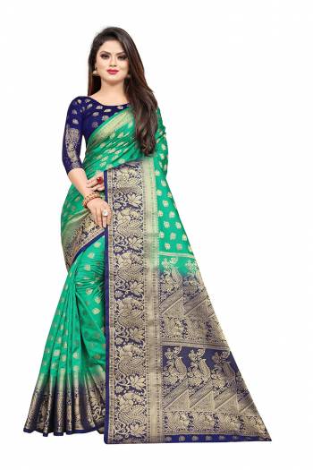 Celebrate This Festive Season In A Proper Traditonal Look Wearing This Silk Based Saree In Sea Green Color Paired With Royal Blue Colored Blouse. This Saree And Blouse Are Fabricated On Art Silk Beautified with Weave. 