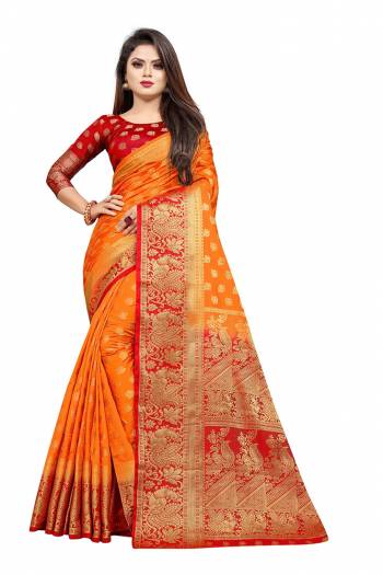 Celebrate This Festive Season In A Proper Traditonal Look Wearing This Silk Based Saree In Orange Color Paired With Red Colored Blouse. This Saree And Blouse Are Fabricated On Art Silk Beautified with Weave. 