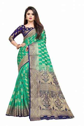 Celebrate This Festive Season In A Proper Traditonal Look Wearing This Silk Based Saree In Sea Green Color Paired With Royal Blue Colored Blouse. This Saree And Blouse Are Fabricated On Art Silk Beautified with Weave. 