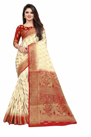 Grab This Beautiful Designer Weaved Saree In Cream color Paired With Red Colored Blouse. This Saree And Blouse Are Fabricated On Art Silk Which Also Gives A Rich Look To Your Personality. 