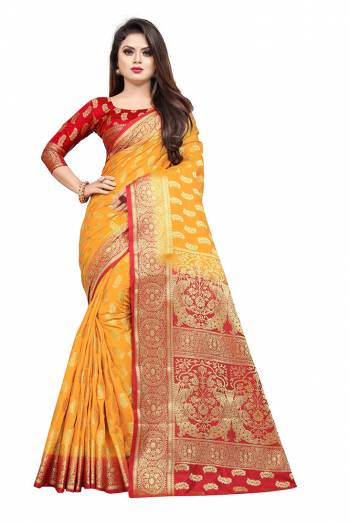 Celebrate This Festive Season In A Proper Traditonal Look Wearing This Silk Based Saree In Musturd Yellow Color Paired With Red Colored Blouse. This Saree And Blouse Are Fabricated On Art Silk Beautified with Weave. 