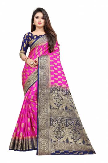 Grab This Beautiful Designer Weaved Saree In Rani Pink color Paired With Royal Blue Colored Blouse. This Saree And Blouse Are Fabricated On Art Silk Which Also Gives A Rich Look To Your Personality. 