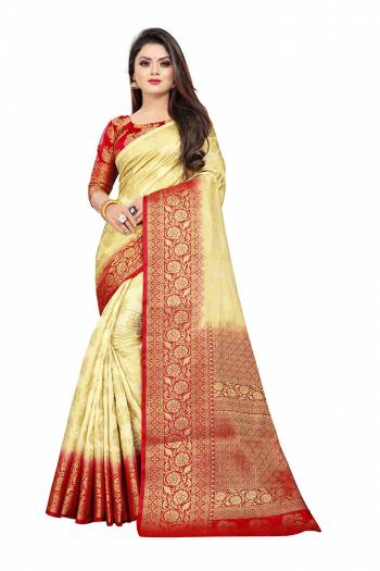 Grab This Beautiful Designer Weaved Saree In Cream color Paired With Red Colored Blouse. This Saree And Blouse Are Fabricated On Art Silk Which Also Gives A Rich Look To Your Personality. 