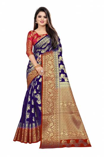 Celebrate This Festive Season In A Proper Traditonal Look Wearing This Silk Based Saree In Royal Blue Color Paired With Red Colored Blouse. This Saree And Blouse Are Fabricated On Art Silk Beautified with Weave. 