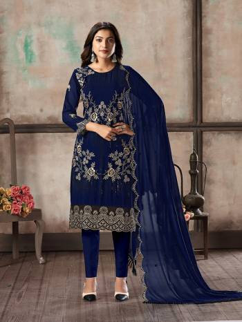 Grab This Pretty Designer Straight Suit In Navy Blue Color Paired With Blue Colored Bottom And Dupatta. Its Top and Dupatta Are Georgette Based Paired With Santoon Bottom. Its Top Is Beautified With Pretty Embroidery Giving An Elegant Look. 