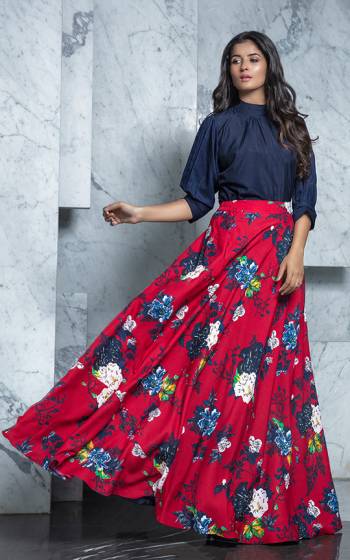 Grab This Pretty Readymade Designer Skirt Top In Navy Blue Colored Top Paired With Dark Pink Colored Skirt. Its Plain Top Is Fabricated On Rayon Paired With Crepe Fabricated Printed Skirt. 