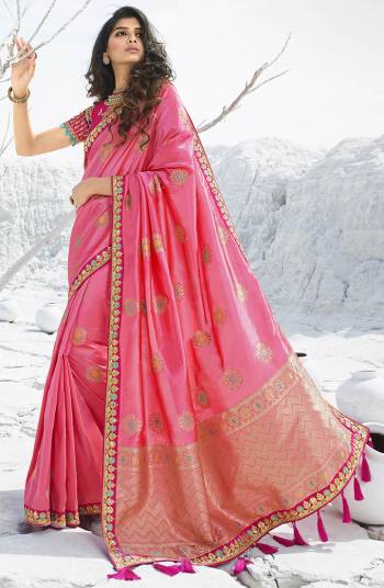 Here Is A Very Pretty Designer Saree In Lovely Pink Color Paired With Contrasting Dark Pink Colored Blouse, This Saree Is Fabricated On Jacquard Silk Paired With Art Silk Fabricated Blouse. Its Rich Silk Fabric Gives A Royal Look To Your Personality. 