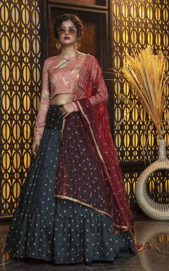 Add This Colorful Designer Lehenga Choli In Peach Colored Blouse Paired With Pine Green Colored Lehenga And Red Colored Dupatta. Its Pretty Blouse Is Rayon Based Paired With Cotton Lehenga And Net Fabricated Dupatta. All Its Fabric Are Light Weight And Ensures Superb Comfort All Day Long. 