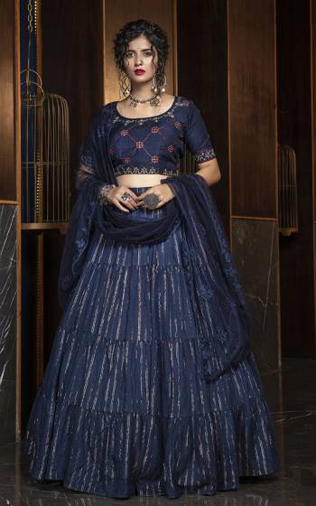 Enhance Your Personality Wearing This Elegant all Over Navy Blue Colored Designer Lehenga Choli. Its Blouse Is Fabricated On Rayon Paired With Cotton Fabricated Lehenga And Net Dupatta. It Is Light In Weight And Easy To Carry All Day Long. 