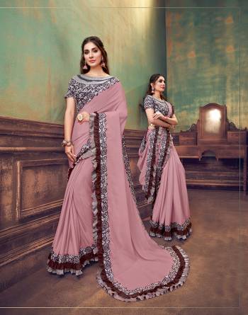 The undeniable charm of soft shades of peach and pink , with the goodness of exquisite machine embroidery and touch of cut-daana hand work is carefully crafted by our designer to make every women who wears this look trendy ,stunning and different from the crowd. The absolutely chic blouse has the perfect sheen to make you shine through the events.