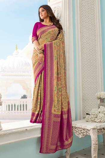 Flaunt Your Rich And Elegant Taste Wearing This Designer Printed Saree In Beige Color Paired With Magenta Pink Colored Blouse. This Saree And Blouse Are Fabricated On Handloom Silk Beautified With Prints and Weaved Broad Border. 