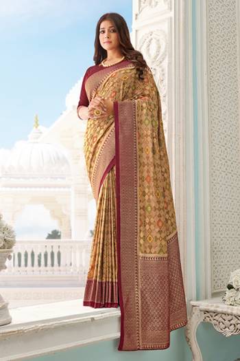 Flaunt Your Rich And Elegant Taste Wearing This Designer Printed Saree In Beige Color Paired With Maroon Colored Blouse. This Saree And Blouse Are Fabricated On Handloom Silk Beautified With Prints and Weaved Broad Border. 