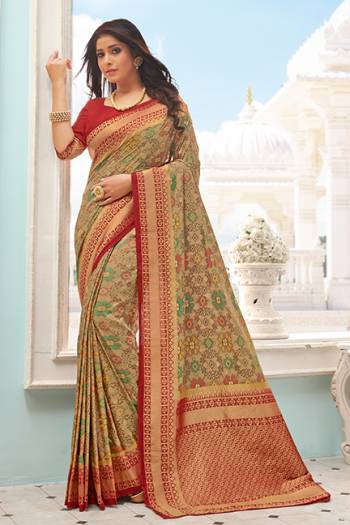 Flaunt Your Rich And Elegant Taste Wearing This Designer Printed Saree In Beige Color Paired With Red Colored Blouse. This Saree And Blouse Are Fabricated On Handloom Silk Beautified With Prints and Weaved Broad Border. 