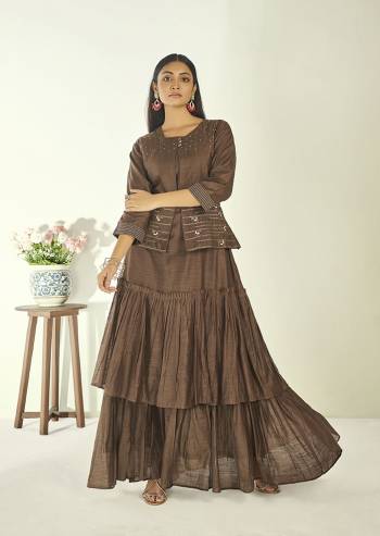 Celebrate This Festive Season With Beauty And Comfort Wearing This Designer Readymade Long Kurti In Brown Color Paired With A Brown Colored Jacket. This Kurti and Jacket Are Fabricated On Cotton Slub Beautified With Hand Work.