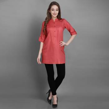 Here Is A Simple And Elegant Looking Readymade Short Kurti For Your Casual Wear In Pink Color. This Plain Kurti Is Fabricated On Rayon , Available In All Regular Sizes. It Can Be Paired With Pants, Leggings Or Denim. 