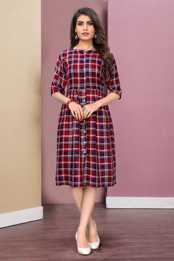 Here Is A Pretty Checks Printed Readymade Kurti Fabricated On Rayon. This Kurti Has Lovely Tunic Pattern Which Is Comfortable And Easy To Carry All Day Long. 