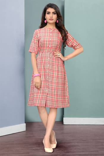 Here Is A Pretty Checks Printed Readymade Kurti Fabricated On Rayon. This Kurti Has Lovely Tunic Pattern Which Is Comfortable And Easy To Carry All Day Long. 