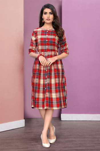 Here Is A Pretty Checks Printed Readymade Kurti Fabricated On Rayon. This Kurti Has Lovely Tunic Pattern Which Is Comfortable And Easy To Carry All Day Long. 