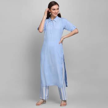 Grab This Simple And Elegant Readymade Pair Of Kurti and Plazzo In Blue and White Color. This Pretty Pair Is Fabricated On Rayon Beautified With Lining Prints. It Is Light In Weight And Easy To Carry All Day Long. 