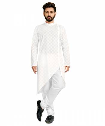 Take your ethnic style quotient to the next level by wearing this?fashionable kurta set. which has been designed keeping the latest trends in mind. This set is a must have in a men's ethnic wardrobe. Tailored from finest fabric and fashioned with a banded collar for a dash of style. It will augment your look and make you the centre of attraction at any occasion.