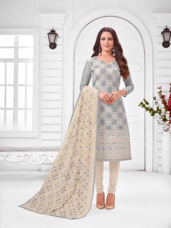 Grab This Designer Straight Suit For Your Semi-Casual Wear In Grey Color Paired With Off-White Colored Bottom and Dupatta. Its Top and Dupatta Are Modal Silk Based Paired With Cotton Bottom.