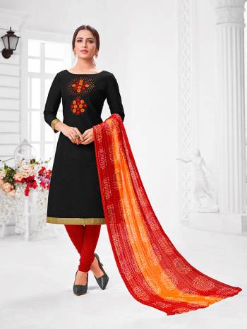 Here Is A Pretty Designer Straight Suit In Black Color Paired With Contrasting Red And Yellow Colored Bottom and Dupatta. Its Top Is Modal Silk Based Paired With Cotton Bottom and Chiffon Dupatta. All Its Fabrics Are Light Weight And Easy To Carry All Day Long. 