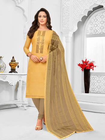 Simple And Elegant Looking Designer Straight Suit Is Here In Occur Yellow Color Paired With Sand Grey Colored bottom And Dupatta. Its Top Is Fabricated On Tussar Art Silk Paired With Cotton Bottom and Chiffon Dupatta.