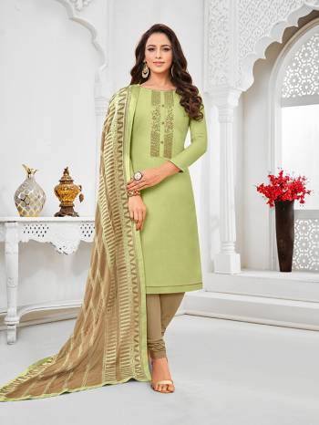 Simple And Elegant Looking Designer Straight Suit Is Here In Pastel Green Color Paired With Sand Grey Colored bottom And Dupatta. Its Top Is Fabricated On Tussar Art Silk Paired With Cotton Bottom and Chiffon Dupatta.