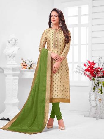 Simple And Elegant Looking Designer Straight Suit Is Here In Beige Color Paired With Parrot Green Colored bottom And Dupatta. Its Top Is Fabricated On Chanderi Silk Paired With Cotton Bottom and Dupatta.