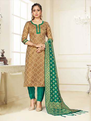 Grab This Pretty Designer Straight Suit In Beige Color Paired With Sea Green Colored Bottom And Dupatta. Its Top, Bottom And Dupatta Are Fabricated On Cotton Silk Beautified With Weave. 