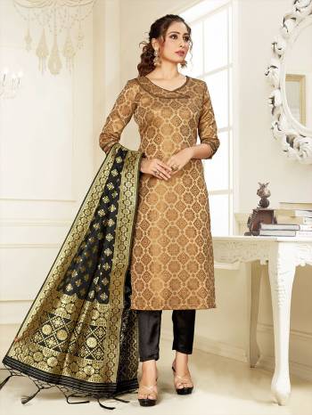 Grab This Pretty Designer Straight Suit In Beige Color Paired With Black Colored Bottom And Dupatta. Its Top, Bottom And Dupatta Are Fabricated On Cotton Silk Beautified With Weave. 