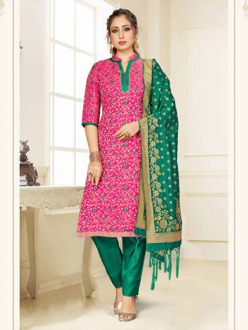 Celebrate This Festive Season Wearing this Designer Straight Suit In Rani Pink And Sea Green Color Paired With Sea Green Colored Dupatta. Its Top, Bottom And Dupatta Are Fabricated Banarasi Art Silk Beautified With Weave. Buy This  Suit Now.