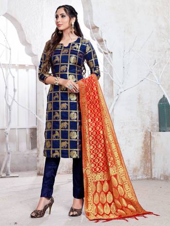 Here Is A Rich And Elegant Looking Silk Based Straight Suit In Navy Blue Color Paired With Red Colored Dupatta. Its Top, Bottom And Dupatta Are Fabricated On Banarasi Silk Beautified With Attractive Weave. Buy Now.