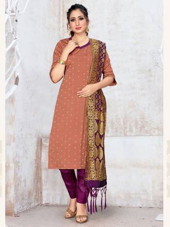 Here Is A Rich And Elegant Looking Silk Based Straight Suit In Beige Color Paired With Purple Colored Bottom And Dupatta. Its Top, Bottom And Dupatta Are Fabricated On Banarasi Silk Beautified With Attractive Weave. Buy Now.