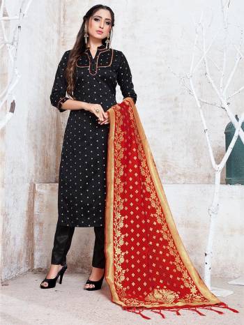 Celebrate This Festive Season In A Proper Traditional Look Wearing This Weaved Straight Suit In Black Color Paired with Red Colored Dupatta. This Pretty Suit Is Fabricated On Banarasi Silk Beautified With Weave. 