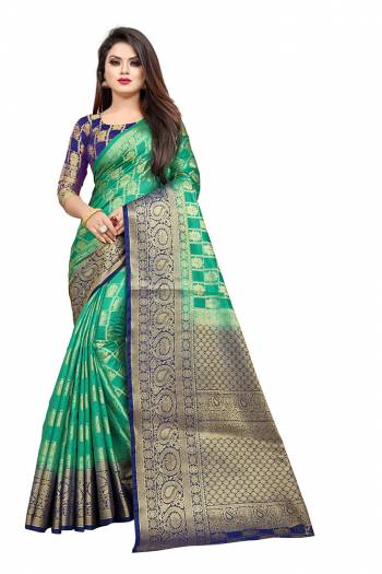 Celebrate This Festive Season In A Proper Traditonal Look Wearing This Silk Based Saree In Sea Green Color Paired With Royal Blue Colored Blouse. This Saree And Blouse Are Fabricated On Art Silk Beautified with Weave. 