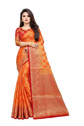 Celebrate This Festive Season In A Proper Traditonal Look Wearing This Silk Based Saree In Orange Color Paired With Red Colored Blouse. This Saree And Blouse Are Fabricated On Art Silk Beautified with Weave. 