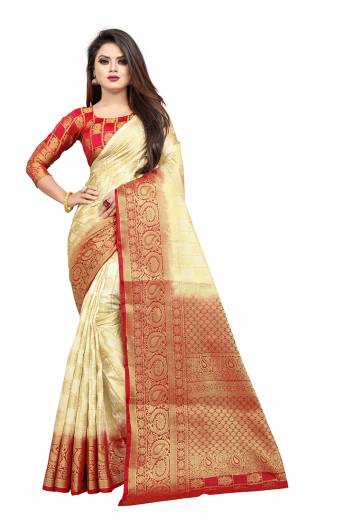 Grab This Beautiful Designer Weaved Saree In Cream color Paired With Red Colored Blouse. This Saree And Blouse Are Fabricated On Art Silk Which Also Gives A Rich Look To Your Personality. 