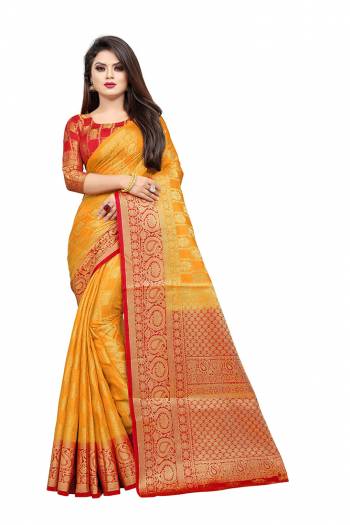 Celebrate This Festive Season In A Proper Traditonal Look Wearing This Silk Based Saree In Musturd Yellow Color Paired With Red Colored Blouse. This Saree And Blouse Are Fabricated On Art Silk Beautified with Weave. 