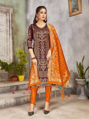 Grab This Pretty Designer Straight Suit In Wine and Orange Color. Its Top, Bottom And Dupatta Are Fabricated On Banarasi Art Silk Beautified With Weave. Its Fabric and Color Gives A Rich Look To Your Perosnality. 