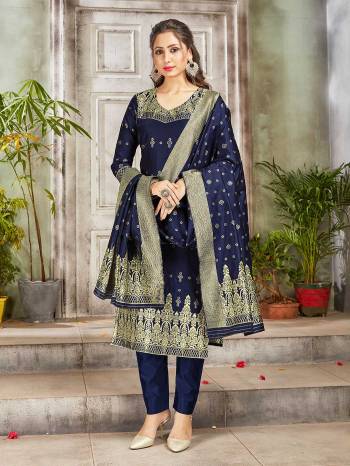 Celebrate This Festive Season Wearing this Designer Straight Suit In Navy Blue Color. Its Top, Bottom And Dupatta Are Fabricated Banarasi Art Silk Beautified With Weave. Buy This  Suit Now.