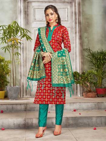 Celebrate This Festive Season Wearing this Designer Straight Suit In Red And Sea Green Color. Its Top, Bottom And Dupatta Are Fabricated Banarasi Art Silk Beautified With Weave. Buy This  Suit Now.