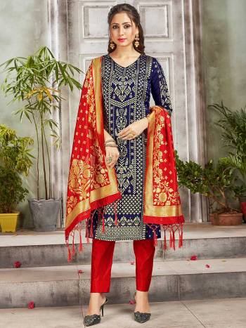 Celebrate This Festive Season Wearing this Designer Straight Suit In Navy Blue and Red Color. Its Top, Bottom And Dupatta Are Fabricated Banarasi Art Silk Beautified With Weave. Buy This  Suit Now.