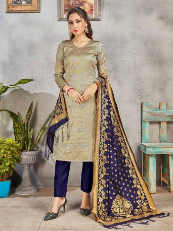 Celebrate This Festive Season Wearing this Designer Straight Suit In Grey and Navy Blue Color. Its Top, Bottom And Dupatta Are Fabricated Banarasi Art Silk Beautified With Weave. Buy This  Suit Now.