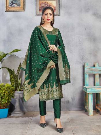 Celebrate This Festive Season Wearing this Designer Straight Suit In Pine Green Color. Its Top, Bottom And Dupatta Are Fabricated Banarasi Art Silk Beautified With Weave. Buy This  Suit Now.