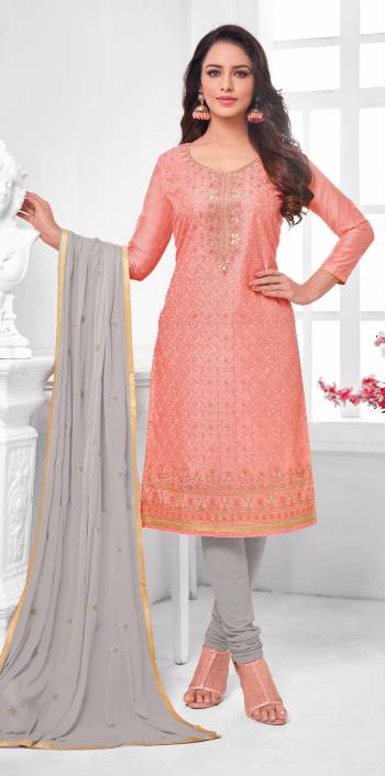 Here Is A Pretty Designer Straight Suit In Peach Color Paired With Contrasting Light Grey Colored Bottom and Dupatta. Its Top Is Modal Silk Based Paired With Cotton Bottom and Chiffon Dupatta. All Its Fabrics Are Light Weight And Easy To Carry All Day Long