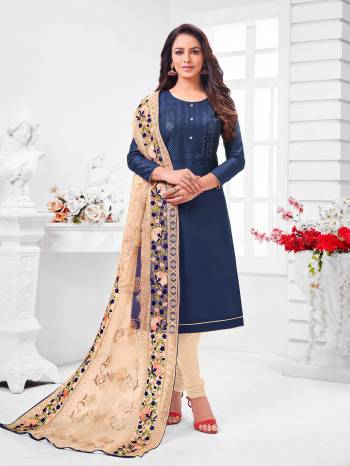 Simple And Elegant Looking Designer Straight Suit Is Here In Navy Blue Color Paired With Cream Colored bottom And Dupatta. Its Top Is Fabricated On Coral Silk Paired With Cotton Bottom and Orgenza Dupatta.