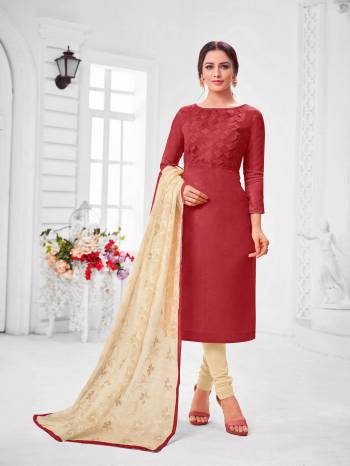 You Will Definitely Earn Lots Of Compliments Wearing This Designer?Straight Suit In Maroon Colored Top Paired With Cream Colored Bottom And Dupatta. Its Top Is Fancy Fabric Based Paired With Cotton Bottom and Chiffon Fabricated Dupatta