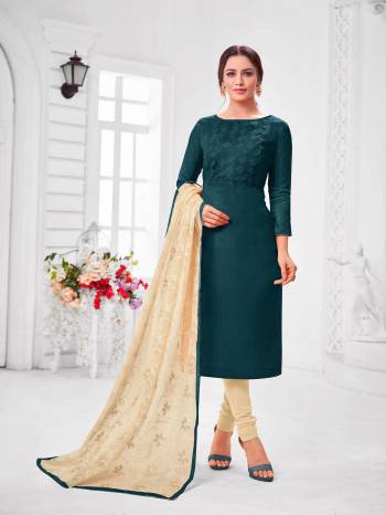 You Will Definitely Earn Lots Of Compliments Wearing This Designer?Straight Suit In Teal Blue Colored Top Paired With Cream Colored Bottom And Dupatta. Its Top Is Fancy Fabric Based Paired With Cotton Bottom and Chiffon Fabricated Dupatta