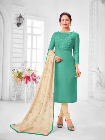 You Will Definitely Earn Lots Of Compliments Wearing This Designer?Straight Suit In Turquoise Blue Colored Top Paired With Cream Colored Bottom And Dupatta. Its Top Is Fancy Fabric Based Paired With Cotton Bottom and Chiffon Fabricated Dupatta